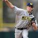 Michigan freshman James Bourque throws a pitch against Eastern Michigan at Eastern on Wednesday.  Melanie Maxwell I AnnArbor.com
